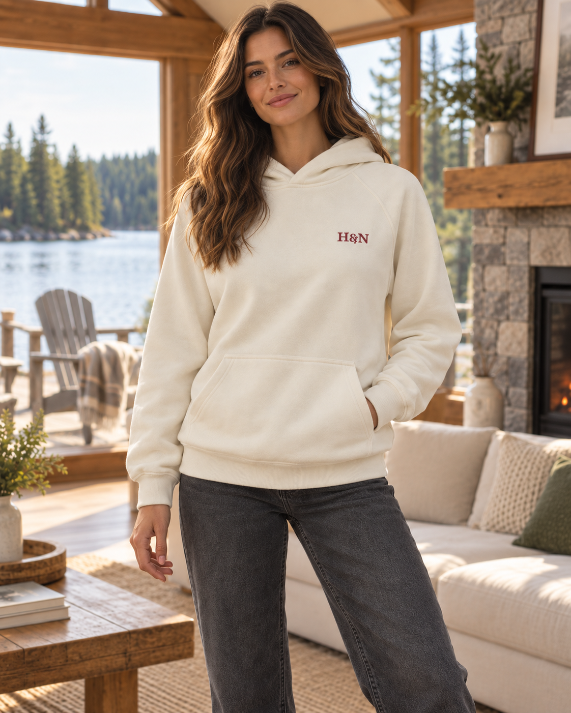 Heavyweight Hoodie in ivory, worn in the lake room with the fire going.