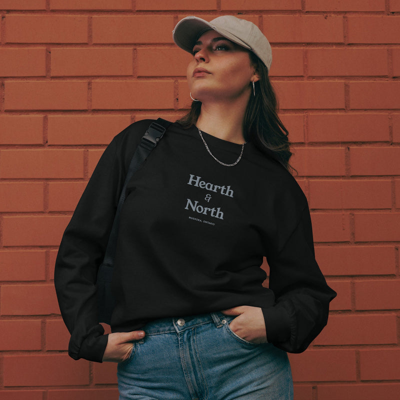 Wordmark Long Sleeve in black, front view.